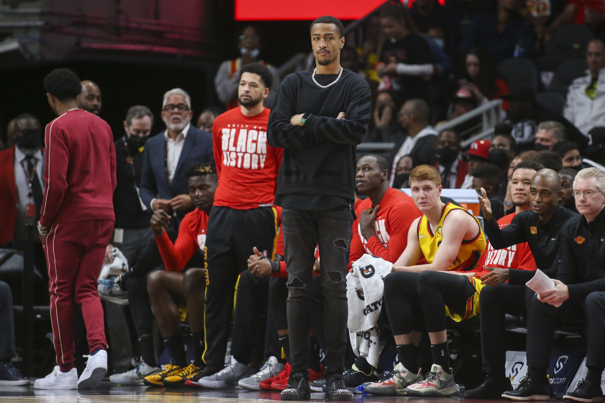 Feb 26, 2022; Atlanta, Georgia, USA; Atlanta Hawks forward John Collins (20) on the sideline against the Toronto Raptors in the second quarter at State Farm Arena.